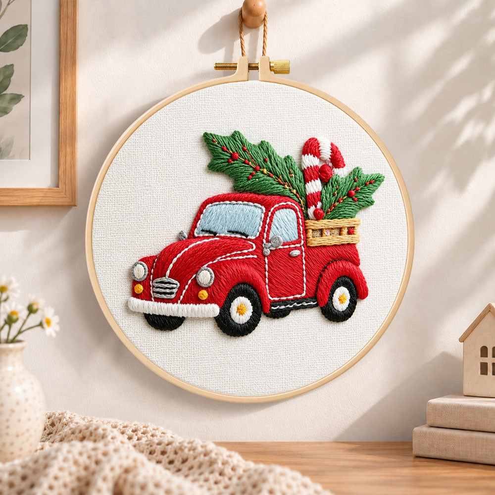 Red pick up with holly embroidery hoop wall art displayed as warm and cozy handmade home decor