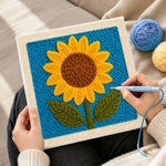 Creating handmade a cheerful sunflower punch needle artwork