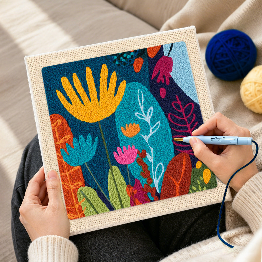 Creating handmade abstract floral with vibrant leaves punch needle artwork