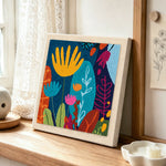 Abstract floral with vibrant leaves punch needle artwork displayed on a table