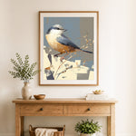 Finished abstract little bird cross stitch artwork displayed as home decor