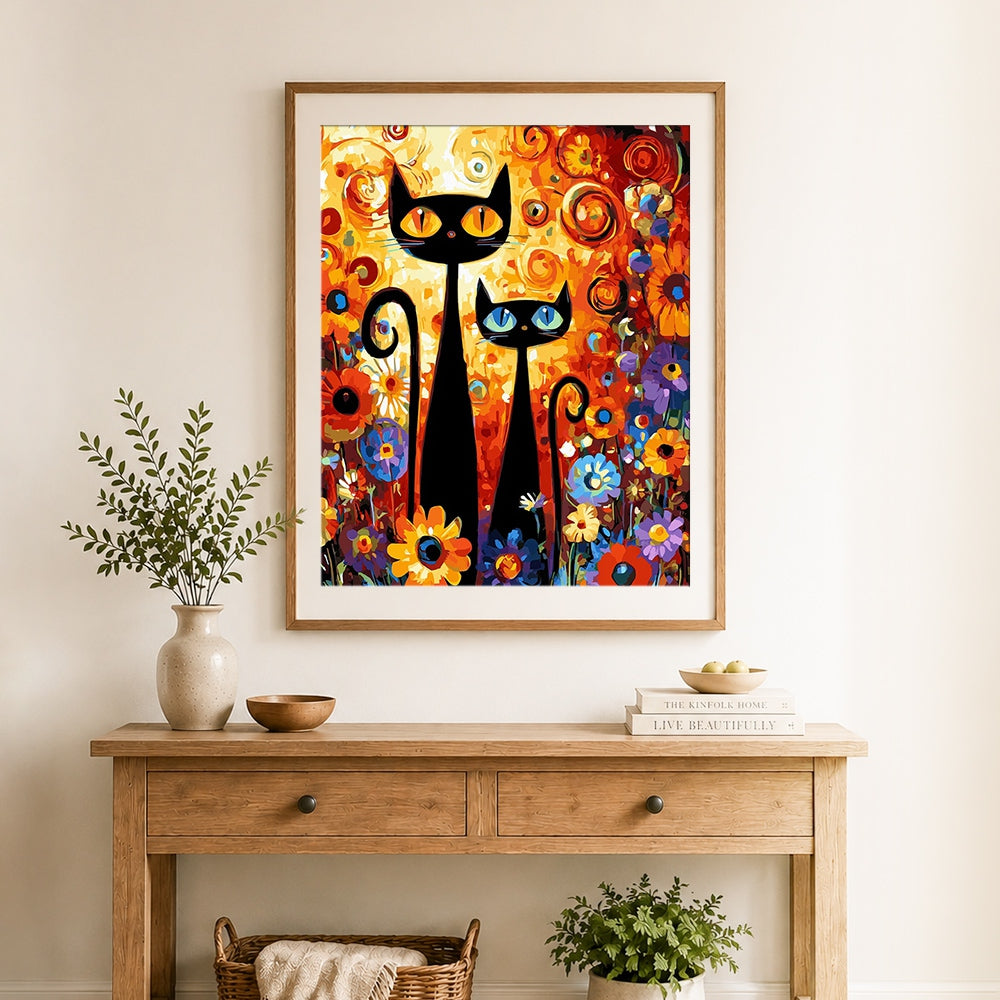 Finished abstract long cats in flowers cross stitch artwork displayed as home decor