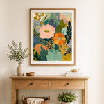 Finished abstract pink and orange flowers with dotted patterns cross stitch artwork displayed as home decor