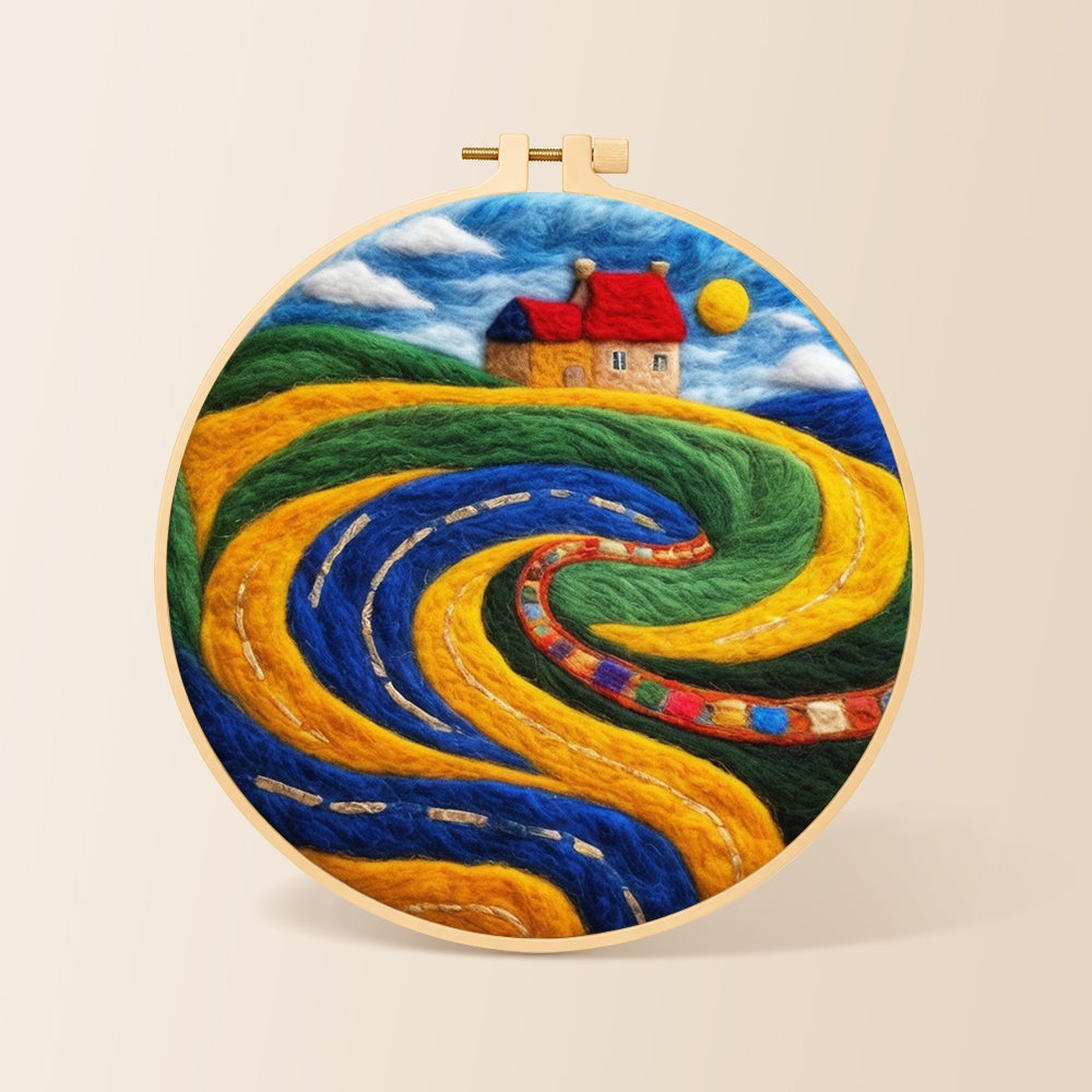 Abstract swirling fields and red roof cottage needle felting kit for beginners with a round wooden frame
