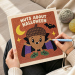 Creating handmade acorn vampire halloween character punch needle artwork