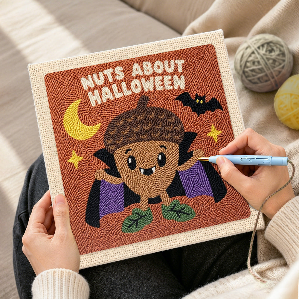 Creating handmade acorn vampire halloween character punch needle artwork