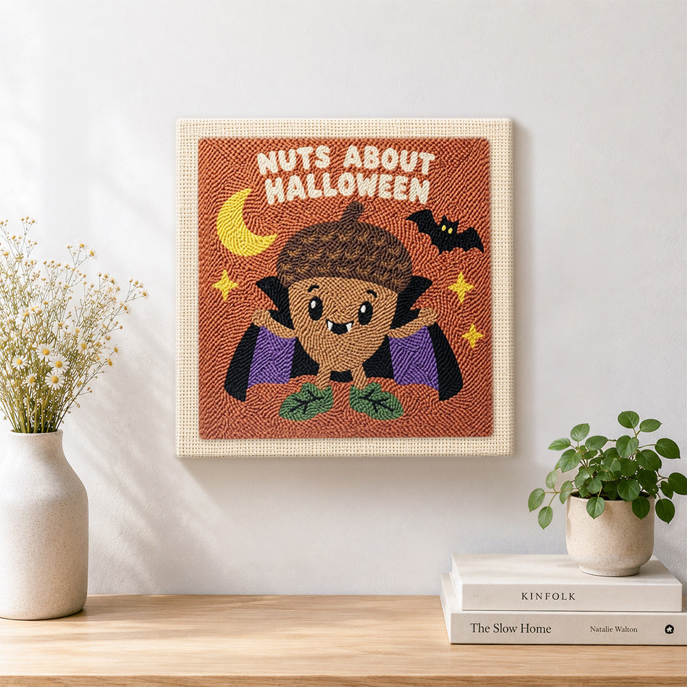 Finished acorn vampire halloween character artwork displayed on a wall