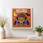 Finished acorn vampire halloween character artwork displayed on a wall
