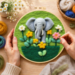 Creating the adorable baby elephant with flowers wool painting by hand with a felting needle