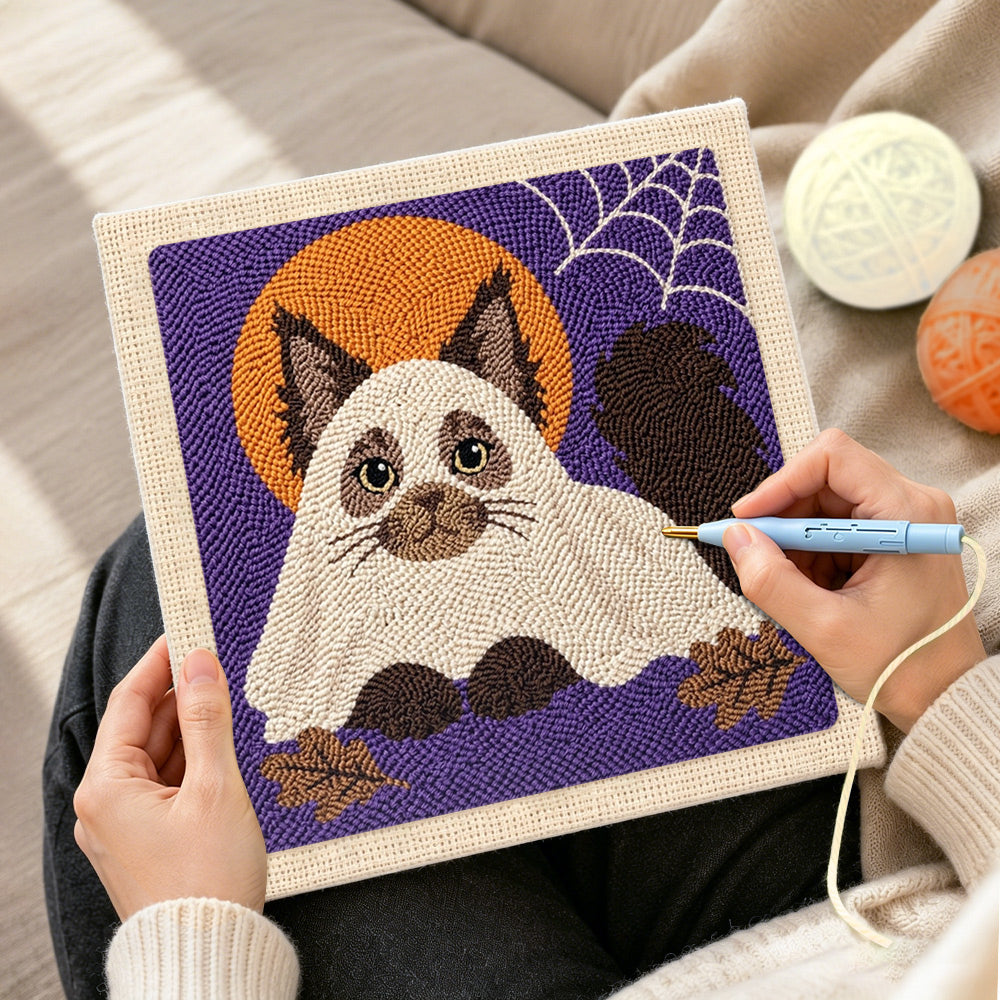 Creating handmade adorable cat in ghost costume punch needle artwork