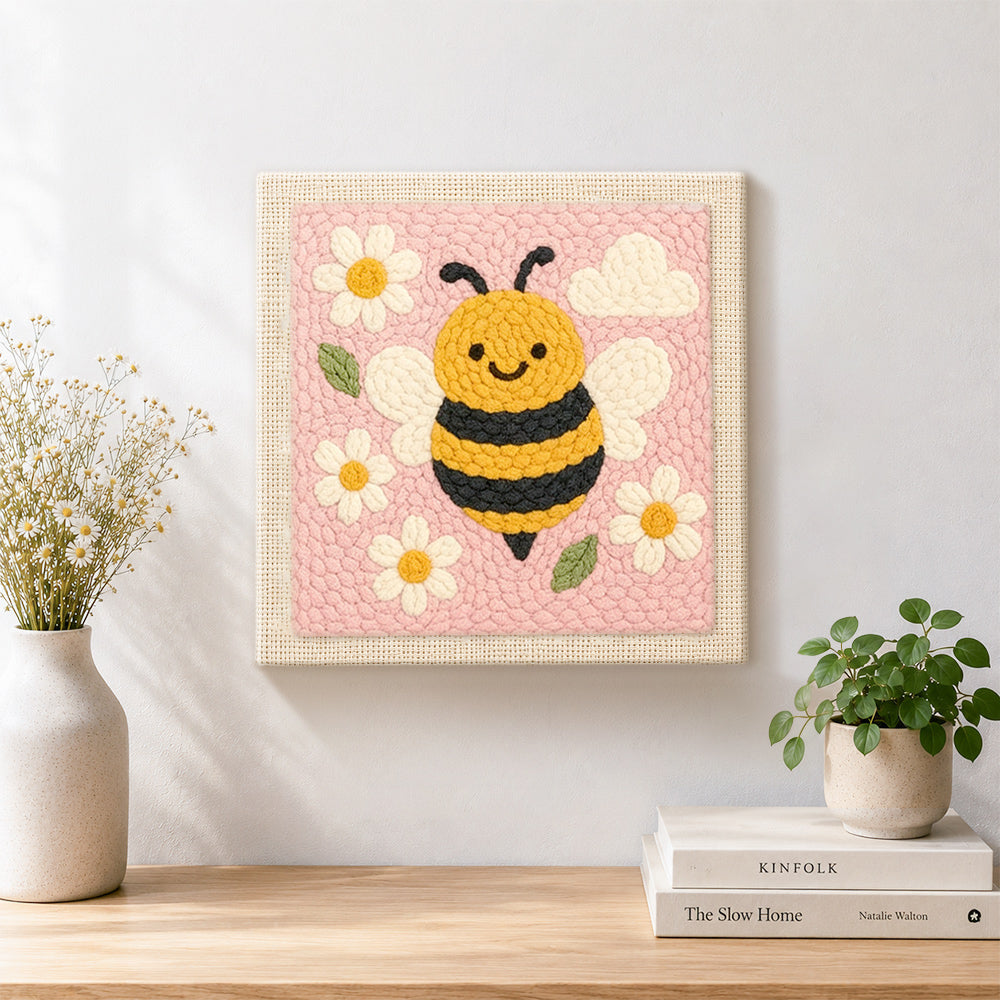 Finished adorable honey bee artwork displayed on a wall