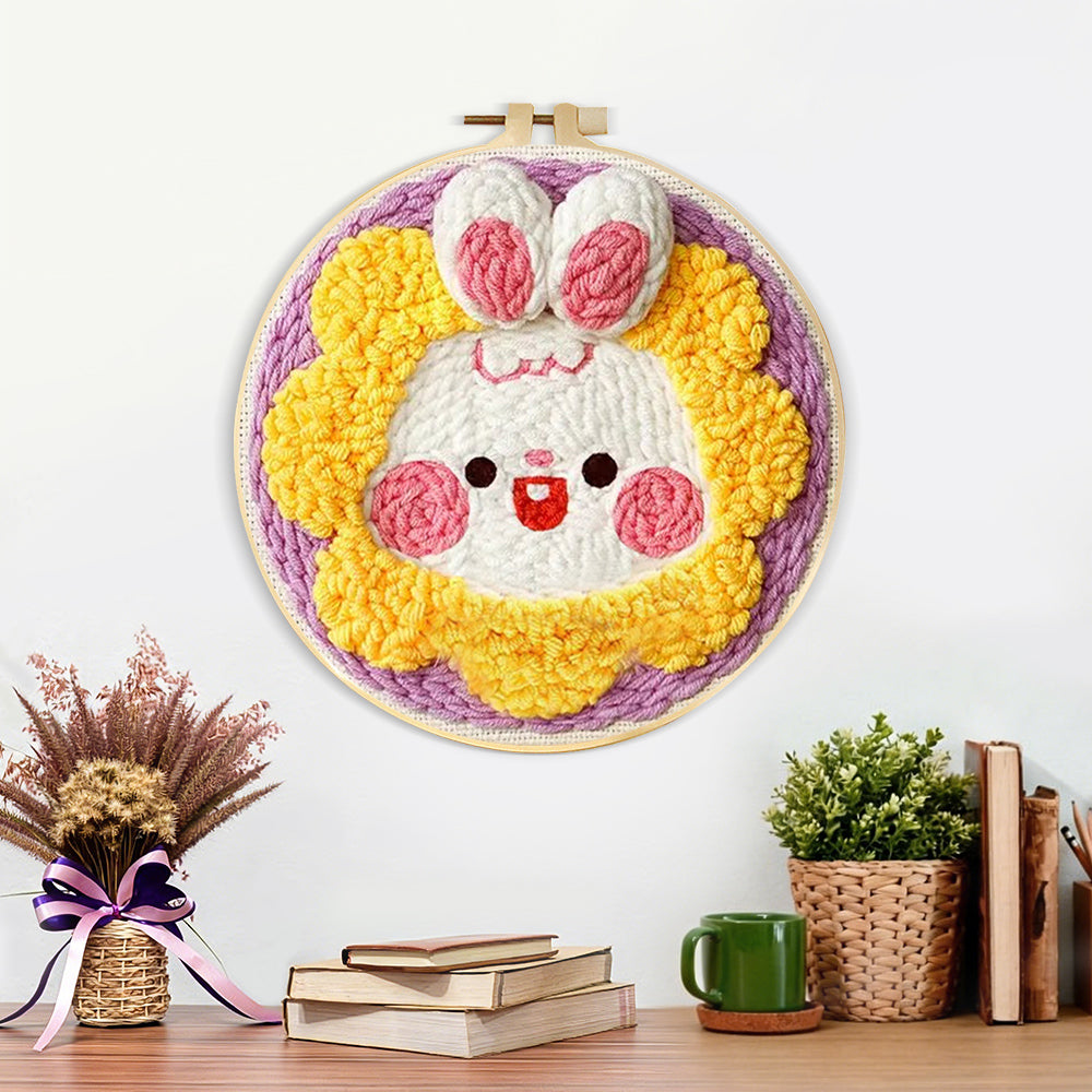 Finished adorable sunflower bunny artwork displayed on a wall