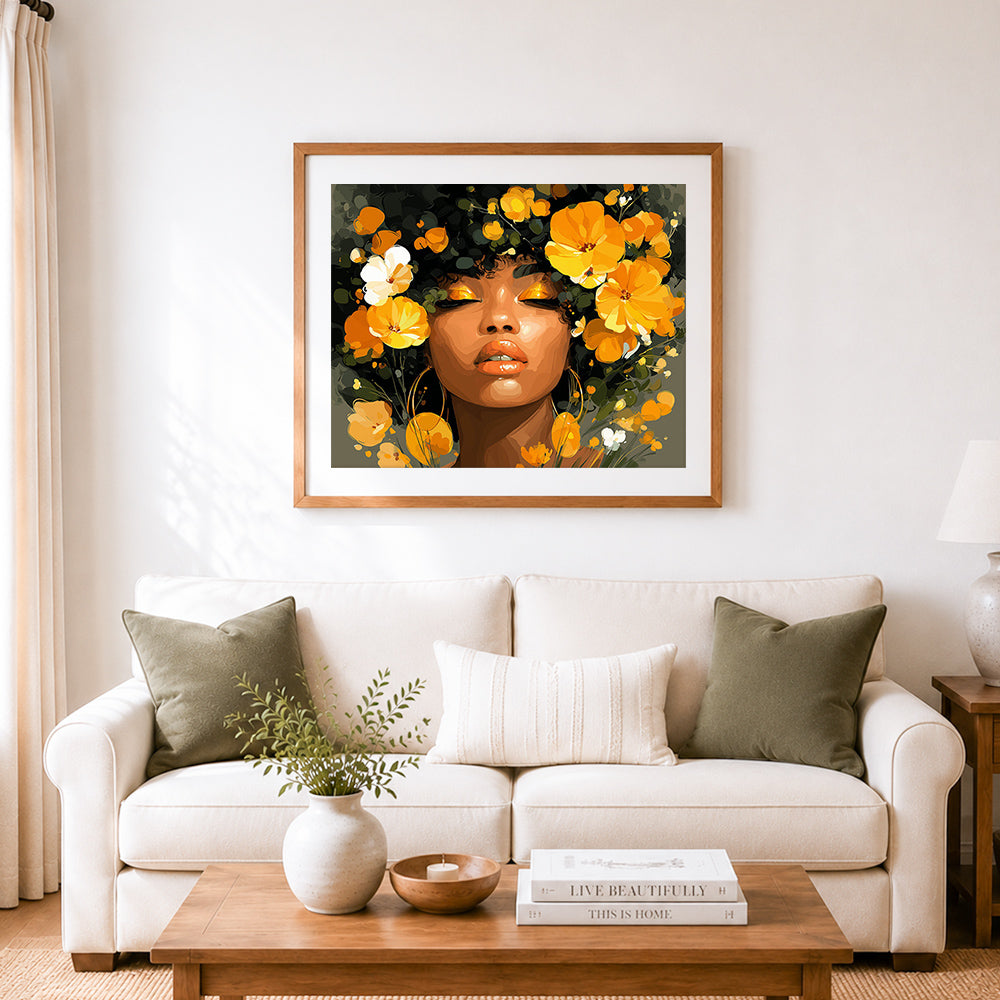 Finished african woman and golden flowers cross stitch artwork displayed as home decor