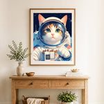 Finished astronaut calico cat cross stitch artwork displayed as home decor