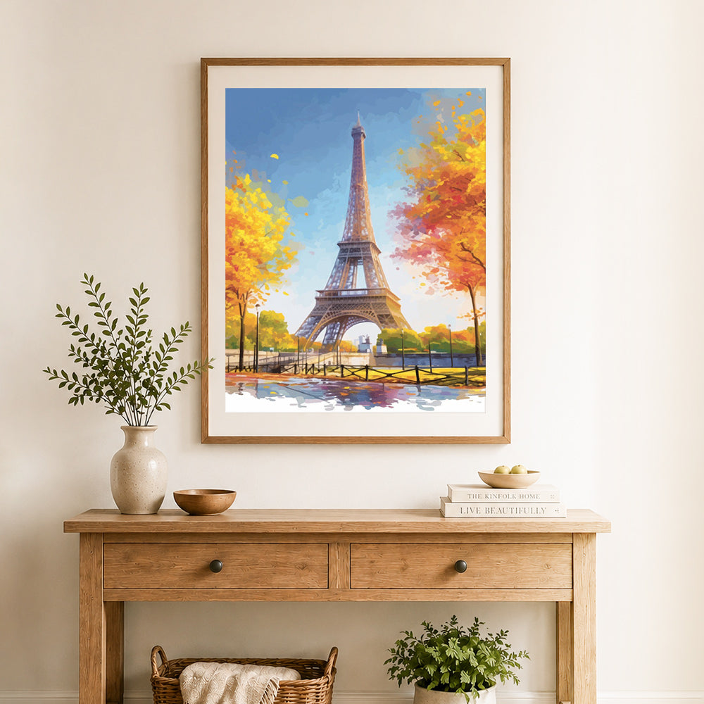 Finished autumn eiffel tower cross stitch artwork displayed as home decor