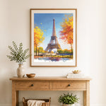 Finished autumn eiffel tower cross stitch artwork displayed as home decor