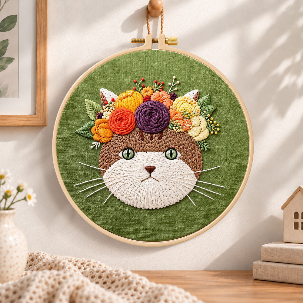 Autumn flower cat embroidery hoop wall art displayed as warm and cozy handmade home decor