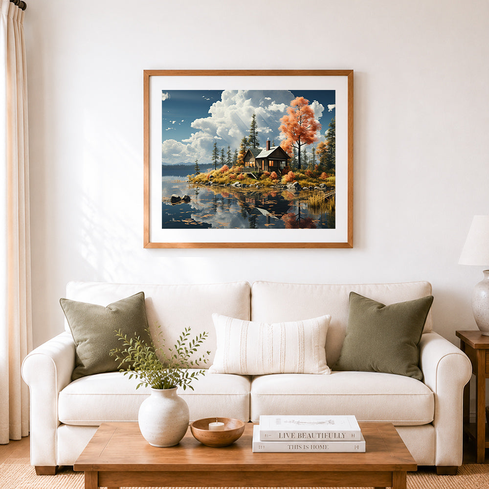 Finished autumn lake cabin with orange trees cross stitch artwork displayed as home decor