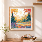Finished autumn mountain landscape cross stitch artwork displayed as home decor