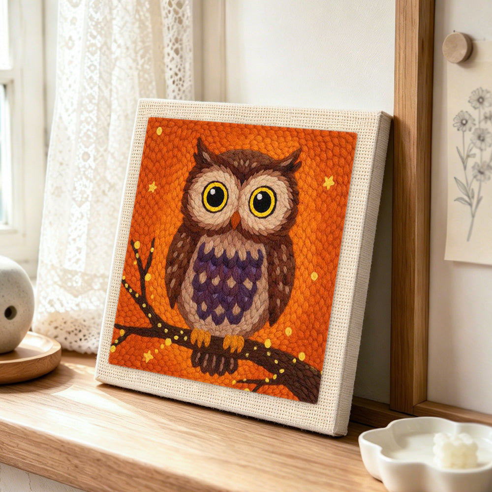 Autumn owl embroidery art punch needle artwork displayed on a table