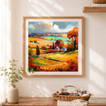 Finished autumn rural valley view cross stitch artwork displayed as home decor