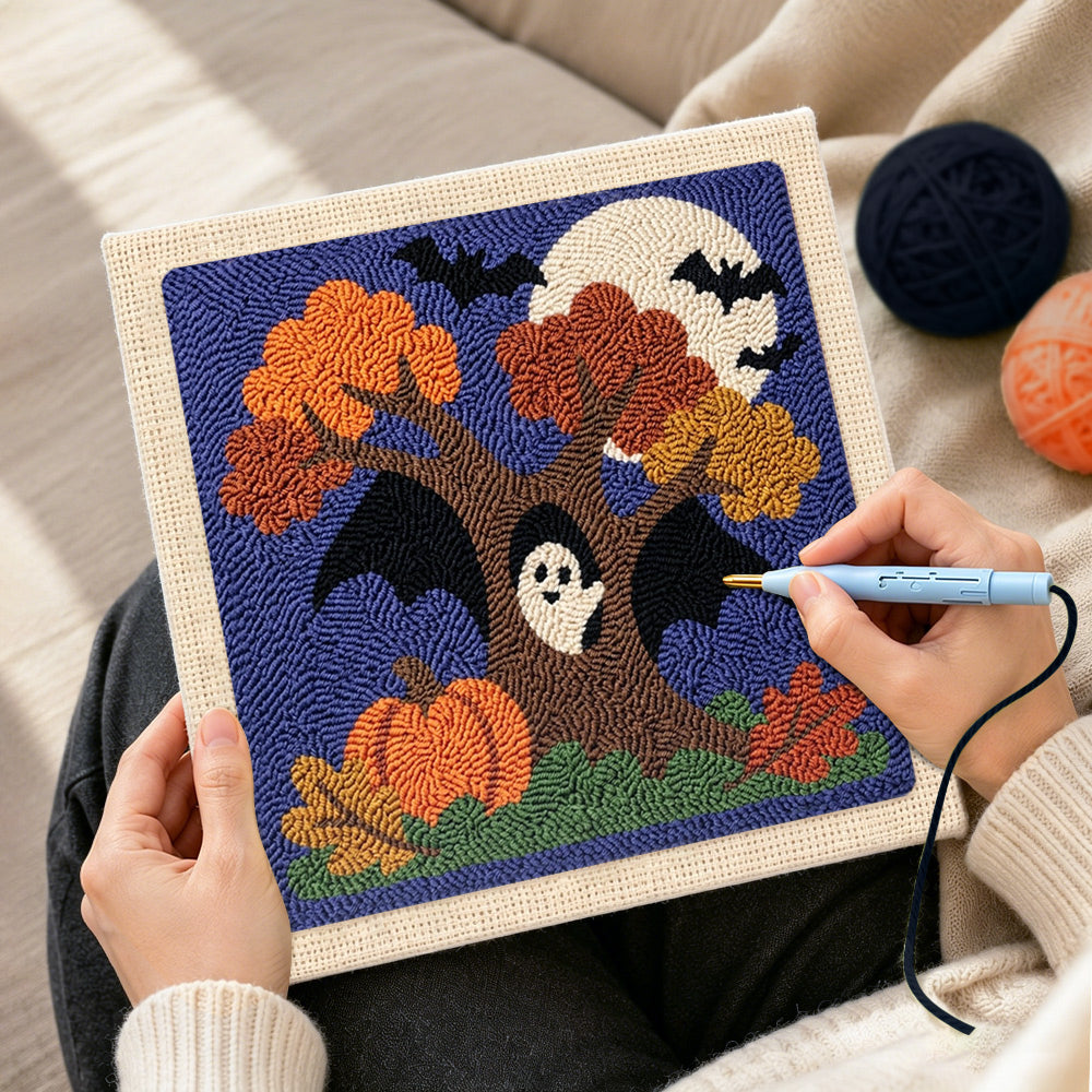 Creating handmade autumn tree ghost punch needle artwork