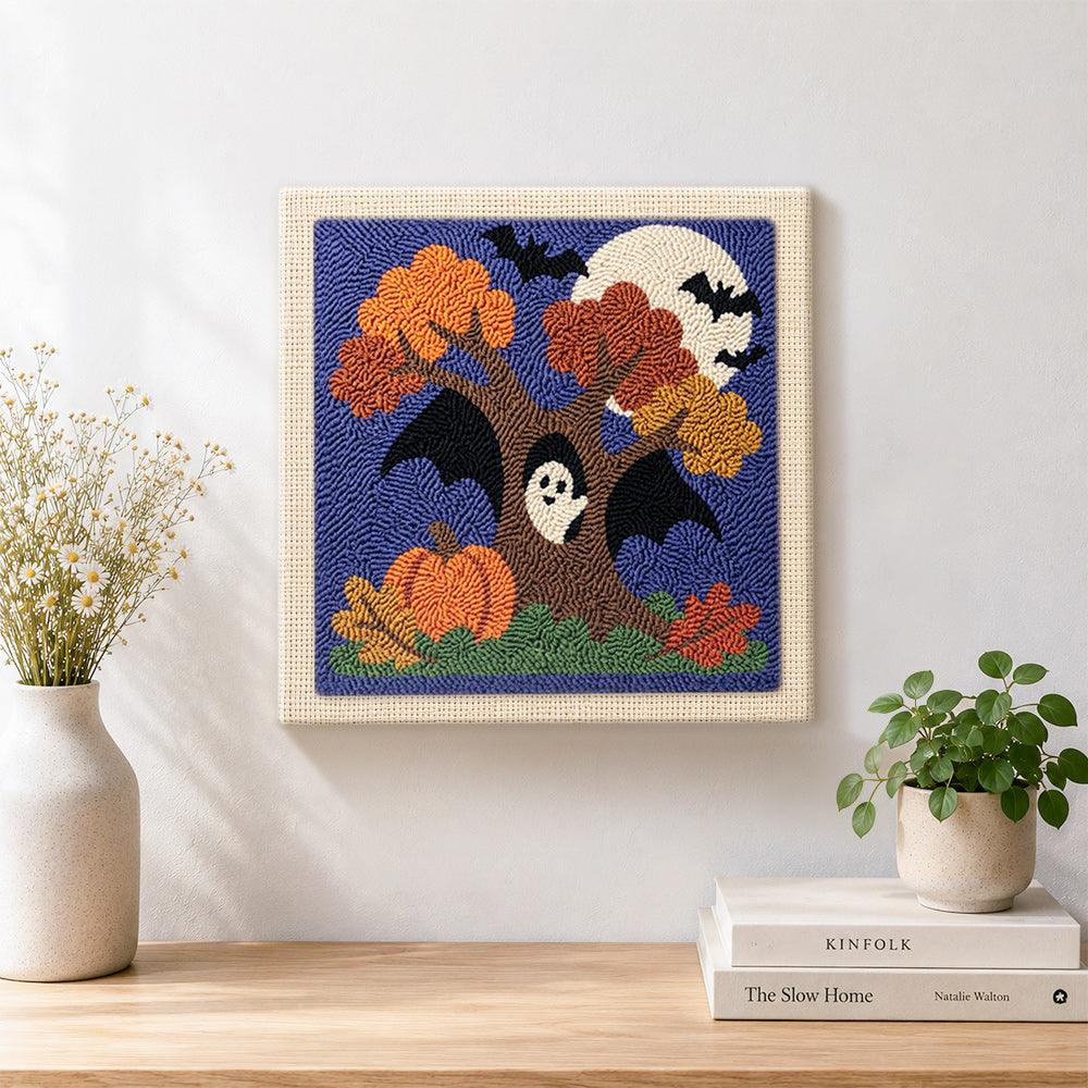 Finished autumn tree ghost artwork displayed on a wall