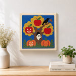 Finished autumn tree ghost scene artwork displayed on a wall