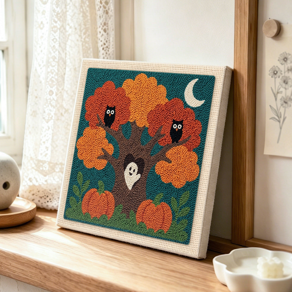 Autumn tree with owls punch needle artwork displayed on a table