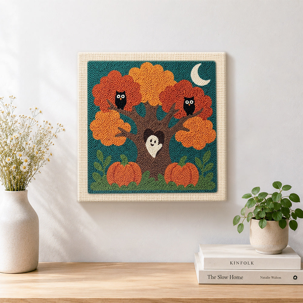 Finished autumn tree with owls artwork displayed on a wall