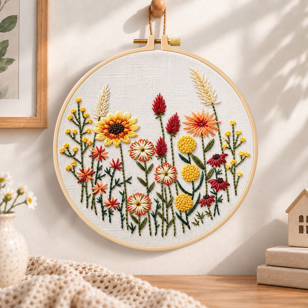 Autumn wildflower embroidery hoop wall art displayed as warm and cozy handmade home decor