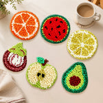Avocado, fig and citrus punch needle coasters used for home decoration