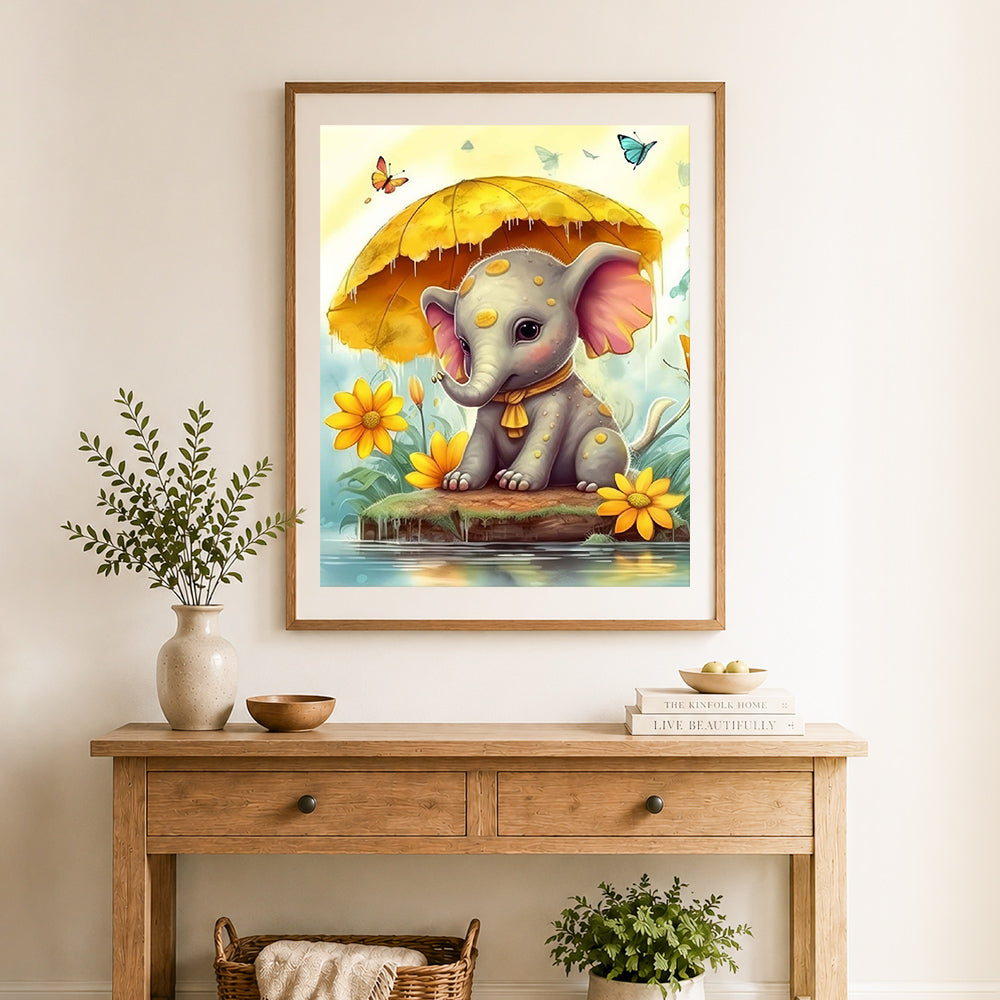Finished baby elephant under leaf cross stitch artwork displayed as home decor