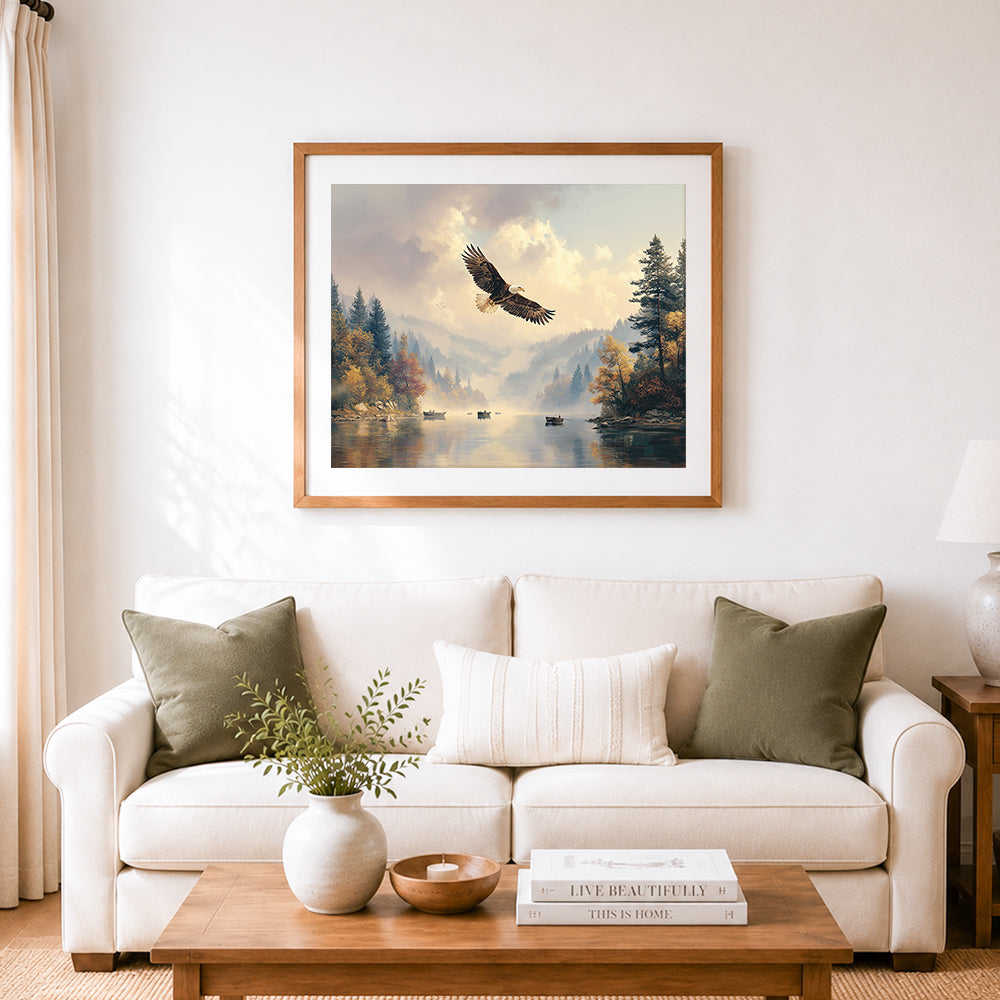 Finished bald eagle soaring over misty forest river cross stitch artwork displayed as home decor