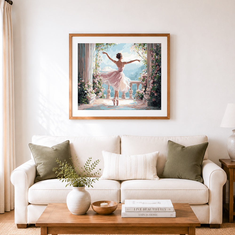 Finished ballerina dancing on balcony amidst flowers cross stitch artwork displayed as home decor