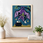 Finished bat hanging upside‑down artwork displayed on a wall