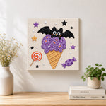 Finished bat purple ice cream cone artwork displayed on a wall