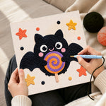 Creating handmade bat with lollipop punch needle artwork
