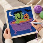 Creating handmade bath time frankenstein punch needle artwork