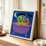 Bath time frankenstein punch needle artwork displayed on a table