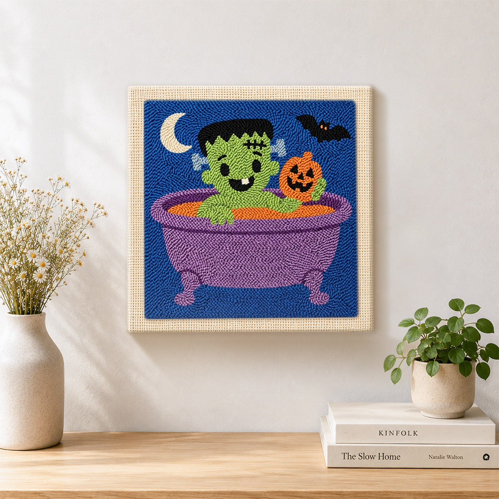 Finished bath time frankenstein artwork displayed on a wall