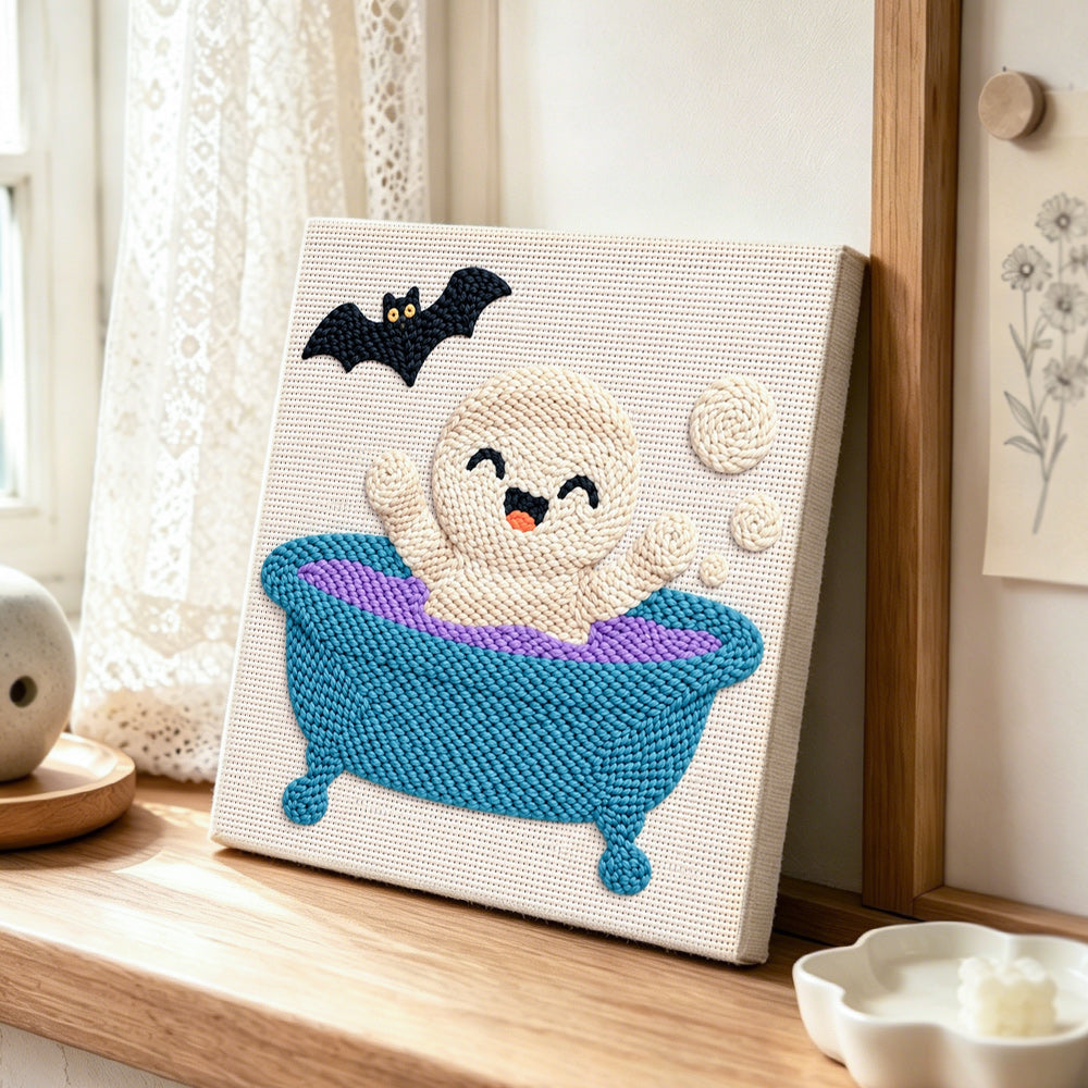 Bath time ghost punch needle artwork displayed on a table