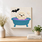 Finished bath time ghost artwork displayed on a wall