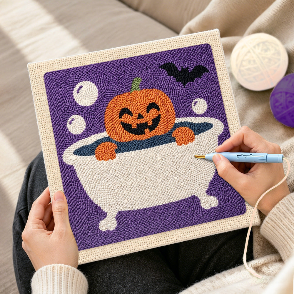 Creating handmade bath time jack‑o‑lantern punch needle artwork