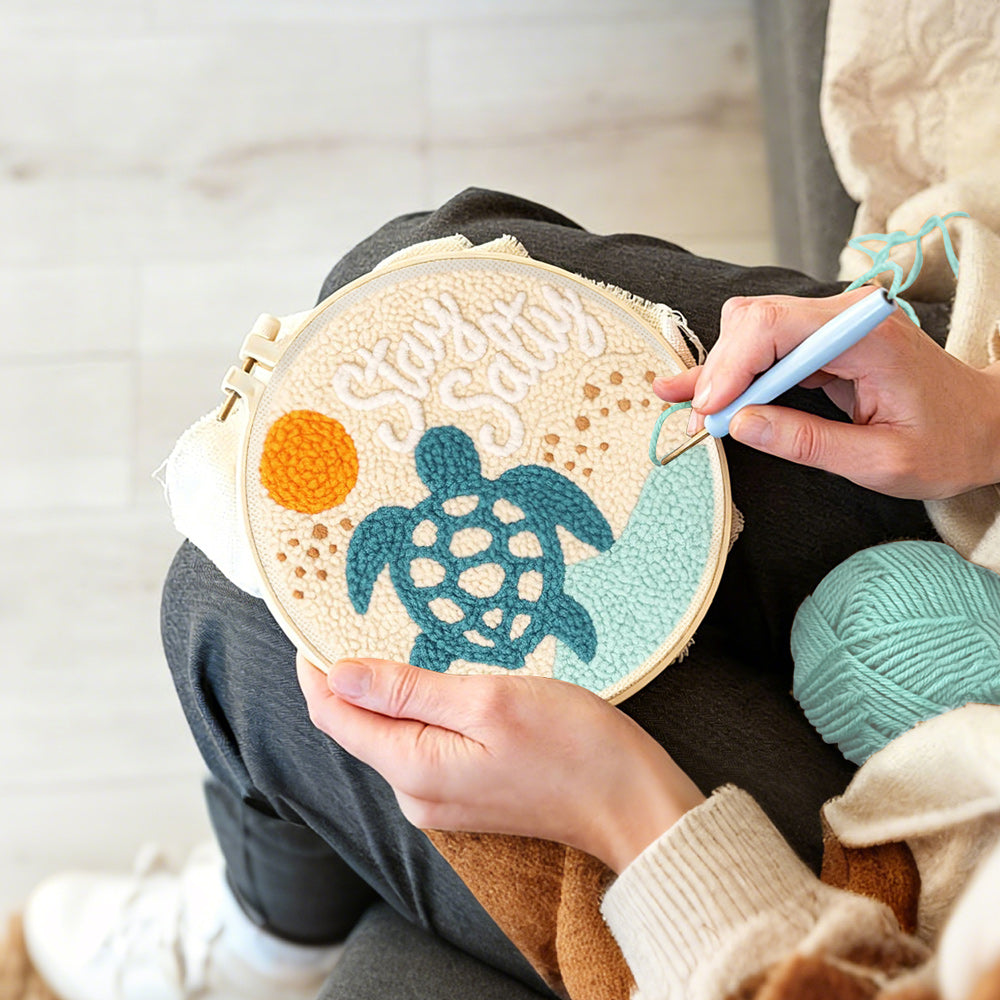 Creating handmade beach turtle punch needle artwork