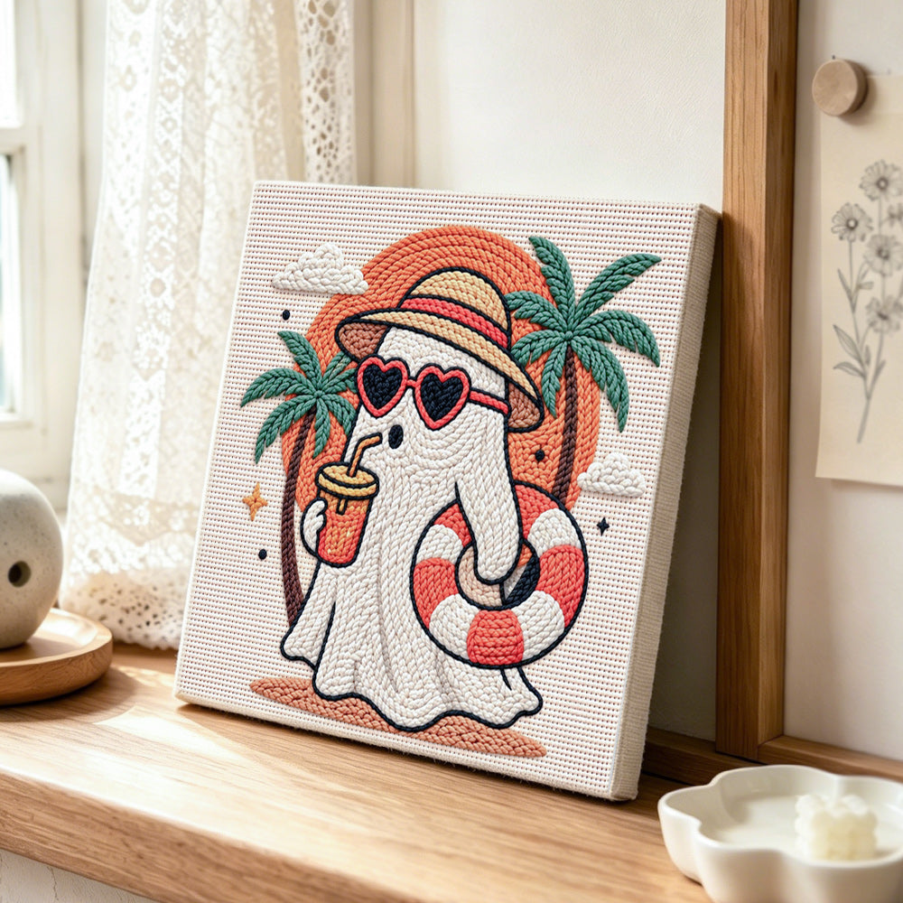 Beach vacation ghost punch needle artwork displayed on a table