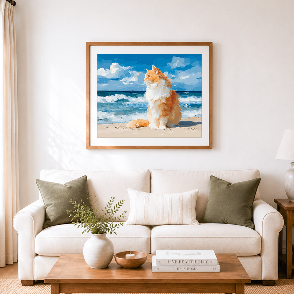 Finished beachside fluffy cat cross stitch artwork displayed as home decor