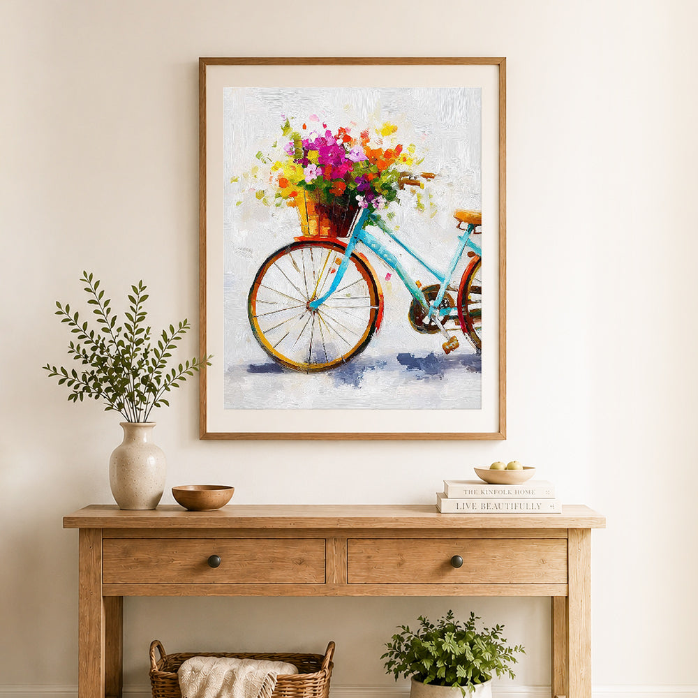 Finished bike with spring blooms cross stitch artwork displayed as home decor