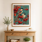 Finished birds on berry branch cross stitch artwork displayed as home decor