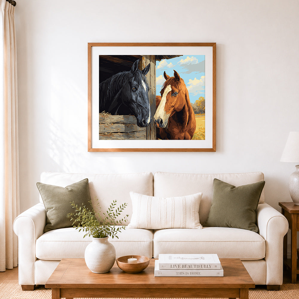 Finished black and brown horses over barn fence cross stitch artwork displayed as home decor